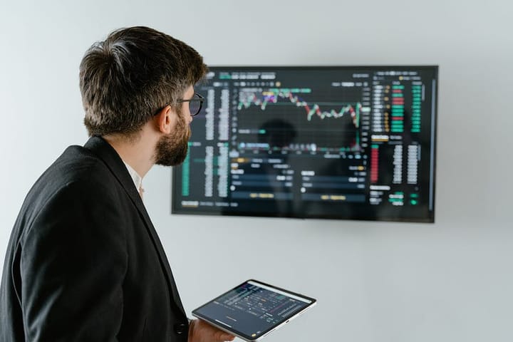 Man looking at the stats
